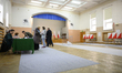 People queue to receive their ballots at a polling station during presidential elections i...