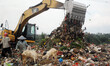 People looking plastic waste for recycling in Cipayung, landfills in Depok, West Java, Ind...