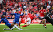 Chris Wood of Nottingham Forest is under pressure from Tosin Adarabioyo of Chelsea, Reece...