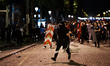 Paris Saint-Germain supporters celebrate after PSG wins the UEFA Champions League final fo...