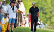 Patrick Cantlay of the United States looks toward the green from the rough on the 10th fai...