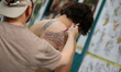 Tattoo artists' stands are present during the 18th TATTOOFEST tattoo convention at EXPO Kr...
