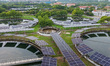 An aerial view shows the Jiangxinzhou Sewage Treatment Plant with a photovoltaic grid conn...
