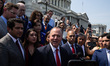 Sen. Adam Schiff (D-CA) (center) and California Democrats speak to reporters about the arr...