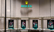 The Rolex brand name glows above a luxury watch display in Vienna, Austria, on June 8, 202...