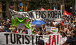 Protestors march in the streets of Barcelona, Catalunya, Spain, on June 15, 2025, during a...
