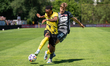 Lisandro Semedo and Jakub Zywicki play during the game between Wieczysta Krakow and Chojni...