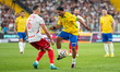 Ronaldinho plays during the Ronaldinho Show, a friendly football match between legends of...