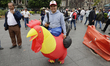 Cockfighters, charros, and bullfighters protest in Mexico City's Zocalo against the law li...