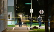 Chicago police use evidence markers to indicate where shell casings are discovered and col...