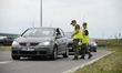 Police and border guards control vehicles at the border between Poland and Lithuania in Bu...