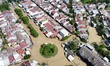 An aerial view shows residential areas submerged by floods after heavy rain overnight in B...