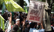 A rally organized by environmental movements, the Confederation paysanne union, and enviro...