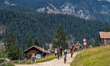 Hikers and cyclists share a mountain trail between Partnachklamm and Schachen near the Wet...