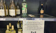 A sign inside a grocery store explains that American-made wine is no longer available for...