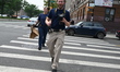 NYPD crime scene unit investigators return to 2295 Grand Concourse, Apartment 4A, to conti...