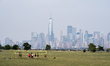 Thick smoke from Canadian wildfires blankets New York City as seen from Jersey City, New J...