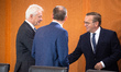 Federal Minister of Defence Boris Pistorius greets Federal Minister of Agriculture, Food a...