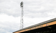 A general view inside the stadium shows floodlights and club branding on the main stand du...