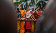 Devotees attend the annual Theru festival in Colombo, Sri Lanka, on August 2, 2025. 