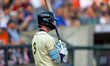 Carson Benge #10 of the Binghamton Rumble Ponies stands on deck during the first inning of...