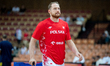 Aleksander Dziewa warms up before the basketball international friendly match between Pola...