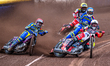 Jaimon Lidsey of Belle Vue Aces in white leads Josh Pickering of Sheffield Tigers in red,...