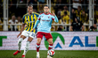 Fenerbahce SK midfielder Archie Brown and Feyenoord Rotterdam forward Anis Hadj Moussa pla...