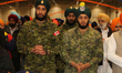 Sikh members of the Canadian Armed Forces (Canadian military) offer prayers at a gurdwara...
