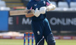 Sam Robson of Middlesex watches a short delivery from Ben Raine of Durham pass by during t...