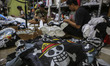 In Karanganyar, Indonesia, on August 13, 2025, a worker produces pirate flags from the Jap...