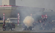 Soldiers fire cannons during a ceremony marking Indonesia's 80th Independence Day in Jakar...