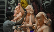 Artisans are busy making idols of Lord Ganesha at a potters' hub ahead of the Ganesh Chatu...