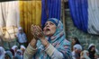 A Kashmiri Muslim woman prays during the annual congregational prayers called ''Khoja Diga...