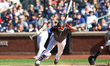 New York Mets' Juan Soto (22) is hit by a pitch during the first inning of a baseball game...