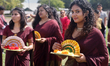 Women take part in a procession during the Onam festival in Woodbridge, Ontario, Canada, o...