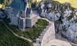 Hikers visit the Roman Catholic Wendelstein Church, located on the Wendelstein mountain at...