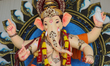 A giant idol of Lord Ganesh is adorned during the Shree Ganesh Chaturthi festival in Bramp...