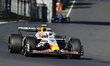 Liam Lawson participates in the free practice of the Italy Grand Prix F1 at Monza Circuit...