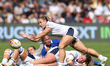 Cassidy Bargell of the United States passes the ball during the Women's Rugby World Cup 20...
