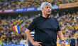 Romania head coach Mircea Lucescu reacts during the International Friendly match between R...