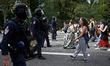 People confront riot policemen. Dozens of thousands of people take to the streets in Toulo...