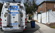NYPD crime scene unit investigators execute a search warrant and retrieve evidence from th...
