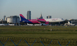 A Wizzair Airbus A321 Neo lands at the Warsaw Chopin International Airport in Warsaw, Pola...