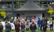 A general view of the ''Prove Me Wrong'' open-air debate takes place in front of the Landt...