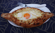 An adjaruli khachapuri is seen in this illustration photo taken in Kutaisi, Georgia on Sep...