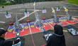 Participants launch rockets made from plastic bottles during the 2025 Sundial Water Rocket...