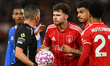 Neco Williams of Nottingham Forest and Morgan Gibbs-White of Nottingham Forest surround re...