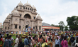 Devotees visit Belur Math, and priests of the Ramakrishna Mission perform a ritual in fron...