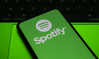 In Creteil, France, on September 29, 2025, the Spotify logo appears on a smartphone placed...